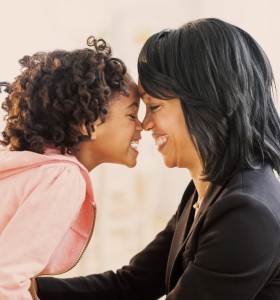 black mother and daughter showing affection