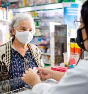 patient at pharmacy counter