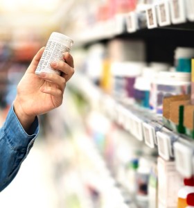 Customer in Store Looking at Label