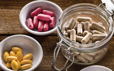 three different kinds of dietary supplement capsules