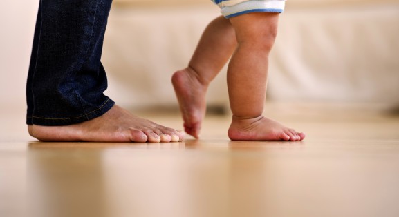 parent and baby feet
