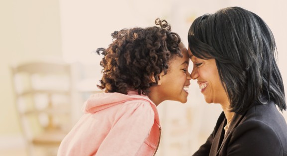 black mother and daughter showing affection